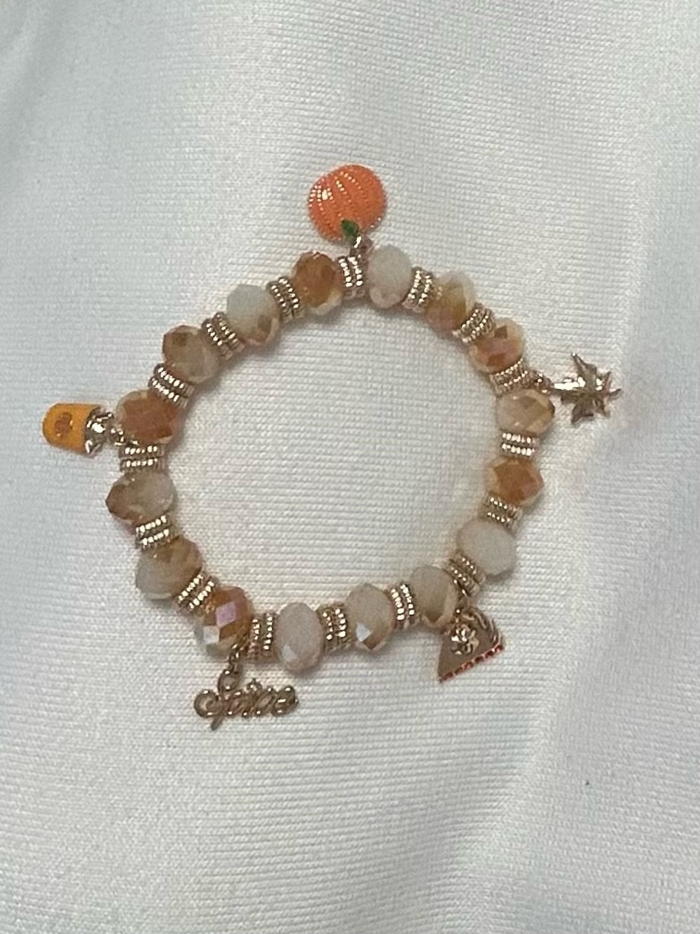 Beige Crystal Stretch Charm Bracelet with Orange Accents